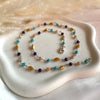 CL120 Collana rosario in argento con pietre prugna, senape, verde e champagne