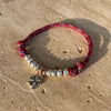 B017 Bracciale con cordino Paracord, granelli nuovi, rondelle + ciondolo al centro (a scelta a parte)
