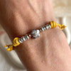 B0278 Bracciale in cordino cerato con rondelle e fiore “grazie maestra” passante