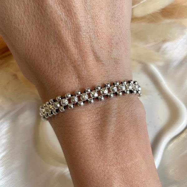 B063 Bracciale Intreccio con pallina martellata