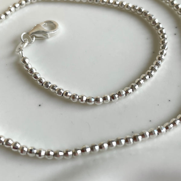 CL0102 Collana in argento con palline disco