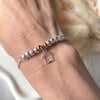 B158 Bracciale con granelli centrali e ciondoli a scelta (non inclusi nel prezzo)