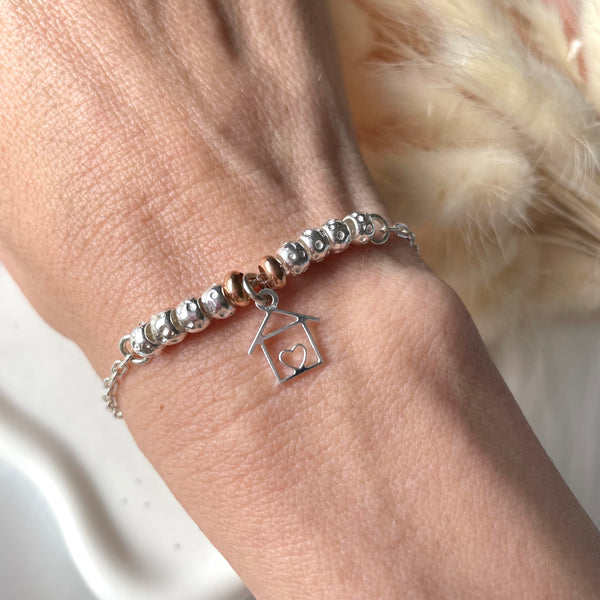 B158 Bracciale con granelli centrali e ciondoli a scelta (non inclusi nel prezzo)