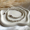 CL0195 Collana argento rondelle irregolari lisce