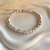 B0301 Bracciale con rondelle irregolari martellate grandi e piccole