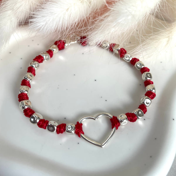 B124 Bracciale con nodi pepite martellate medie e cuore centrale