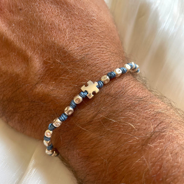 B0297 Bracciale con nodi, pepite e puzzle passante