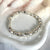 B020 Bracciale con borchie grandi e 2 rondelle