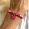 B0296 Bracciale paracord rosa fluo con stella marina smaltata abbinata