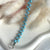 B074 Bracciale intreccio con palline in pasta di turchese
