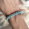 B074 Bracciale intreccio con palline in pasta di turchese