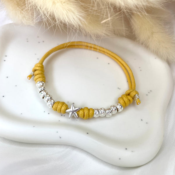 B119 Bracciale con 4 nodi di cordino cerato, 10 granelli nuovi, + ciondolo a scelta (a parte)