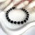 B096 Bracciale con palline onice nero e rondelle