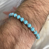 B093 Bracciale con palline turchesi e anelline