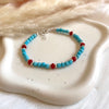 B0294 Bracciale con cubetto aulite, e rondella corallo e argento