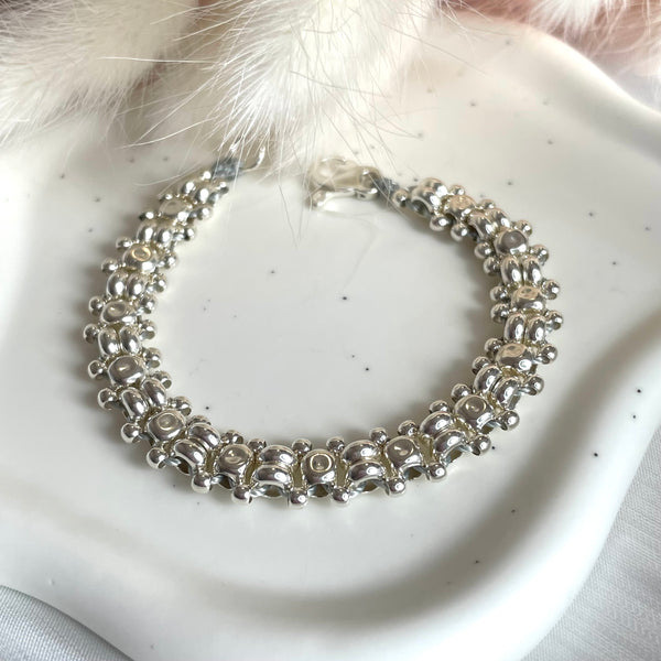 B065 Bracciale intreccio con pepite martellate e rondelle