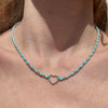 CL082 Collana in pasta di turchese e palline argento con cuore centrale vuoto