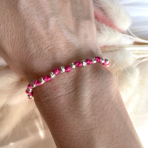 B043 Bracciale con palline martellate intervallato da nodini filo nautico