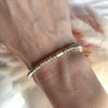 B042 Bracciale con cilindri, palline martellate e rondelle