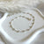 CV014 Cavigliera con catena palline piccole alternate a palline grandi