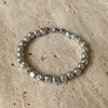 B004 Bracciale pepite martellate (disponibili in diverse dimensioni) con possibilità di mettere ciondoli o passanti.