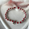B139 Bracciale pepite martellate medie Bimbo/a con nodi e iniziale passante