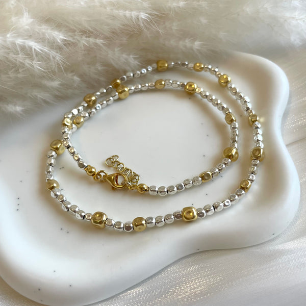 CL0182 Collana argento con pepite mini alternate a pepite di diverse dimensioni dorate, rosate o argentate