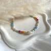 B0293 Bracciale in argento con pepite, cristalli multicolore, perle e volendo conchiglia naturale (inclusa nel prezzo)