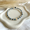 B0297 Bracciale con nodi, pepite e puzzle passante