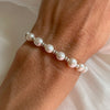 B0193 Bracciale argento rondelle mini e perle di fiume a sassolino