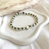 B0297 Bracciale con nodi, pepite e puzzle passante