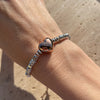 B117 Bracciale con cuore bomby rosato, argentato o dorato al centro, pepite e rondelle