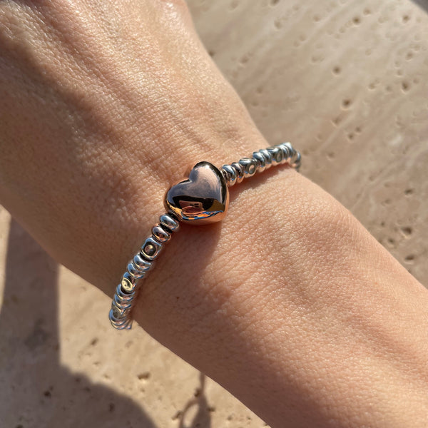 B117 Bracciale con cuore bomby rosato, argentato o dorato al centro, pepite e rondelle
