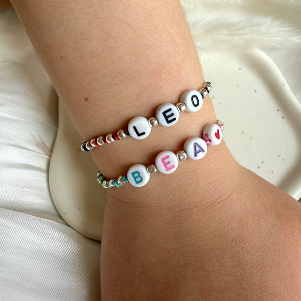 B0260 bracciale baby argento con pepite mini e nodi in filo nautico colorato con iniziali