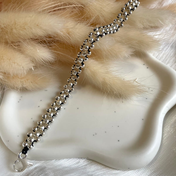 B063 Bracciale Intreccio con pallina martellata