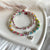 B067 Bracciale mamma e figlia/o con pepite martellate e cuore centrale intervallato da nodini (disponibile in tutte le colorazioni)