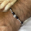 B0101 Bracciale con cordino cerato 4 nodi, granelli nuovi e intrecci rosati + pepitone al centro