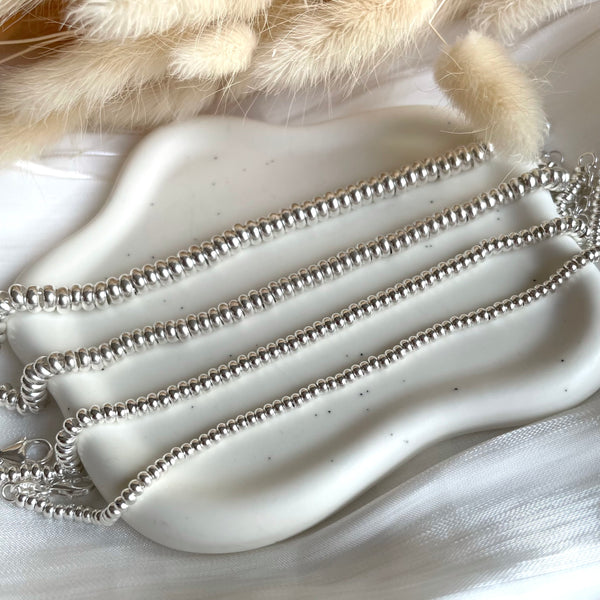 B075 Bracciale con rondelle