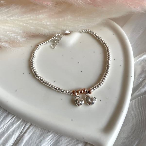 B0267 Bracciale con rondelline e ciondoli cuore mamma e figlio/i