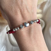 B0243 Bracciale in cordino cerato con rondelle, iniziali e cuore
