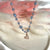 CL050 Rosary necklace with elongated pendant heart with zirconia