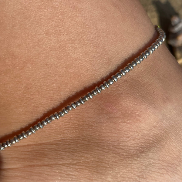 CV006 Cavigliera con palline e rondelle lisce (ciondolo o passante a scelta)