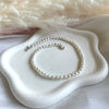 CV020 Cavigliera con perline di fiume bianche