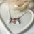 CL078 Family Necklace with Family First Pendants and Central Pink Zirconia Heart