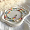 CL0188 Collana in argento con pepite, cristalli multicolore, perle e volendo conchiglia naturale centrale (inclusa nel prezzo)