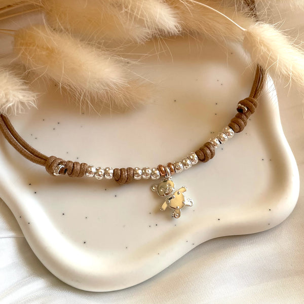 CL023 Collana Orsetto Bubi con cordino cerato e granelli