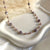 CL113 Collana rosario in argento con cristalli malva