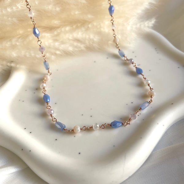 CL053 Rosary necklace with blue colored hydrothermal heart