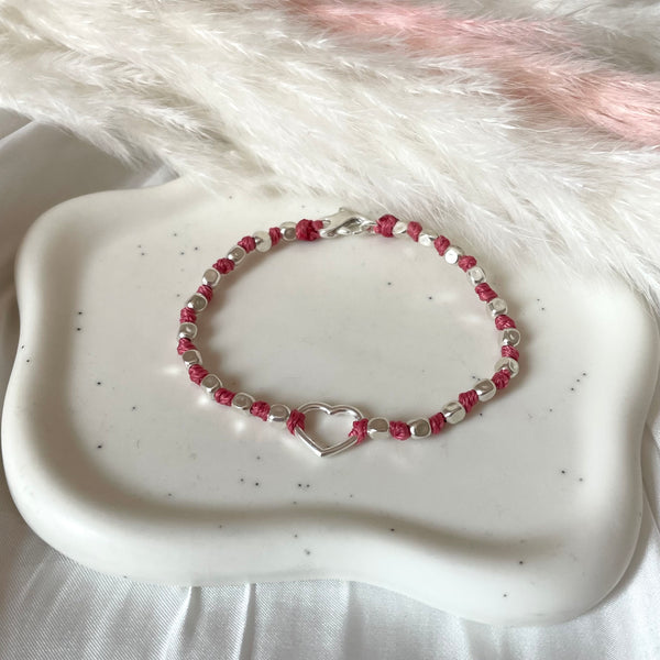 B0250 Bracciale con nodi pepite martellate piccole e cuore centrale piccolo