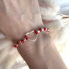 B124 Bracciale con nodi pepite martellate medie e cuore centrale